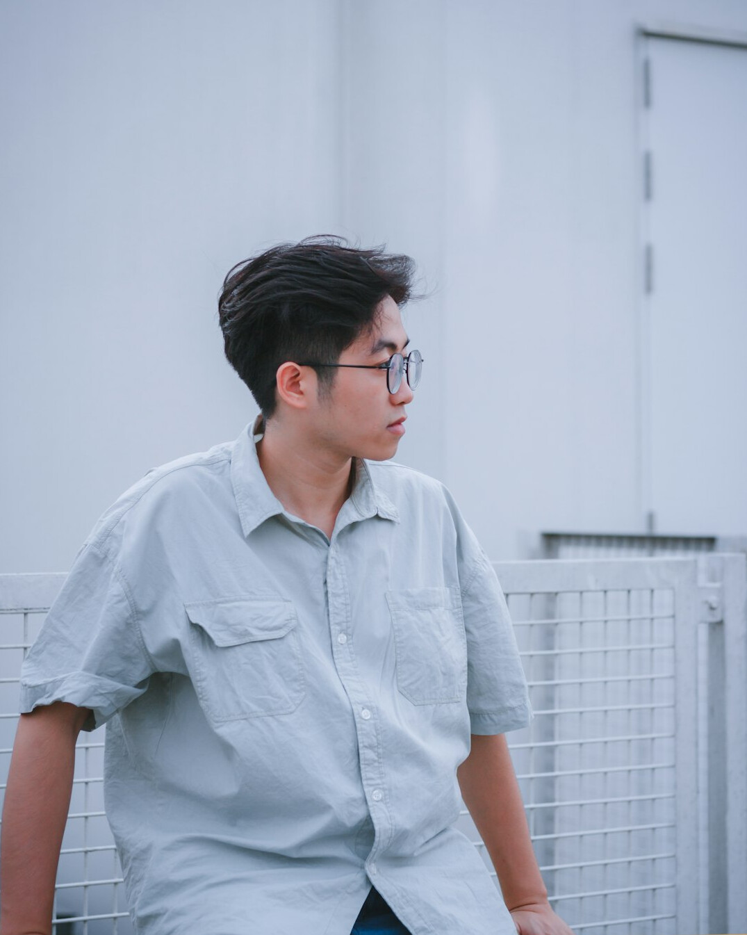 Portrait of a young man in a light shirt