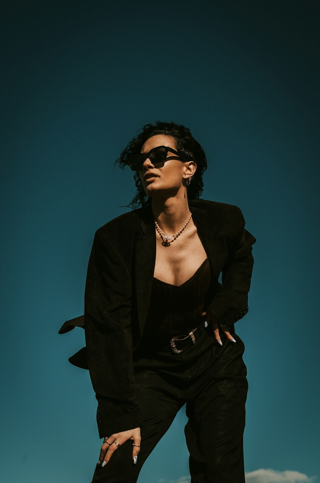 Portrait of a confident woman in a dark blazer